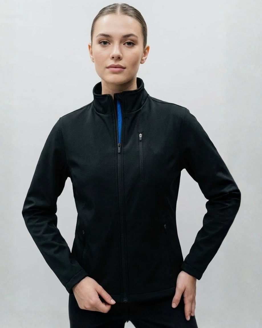 Person wearing a black jacket with a blue zipper against a white background